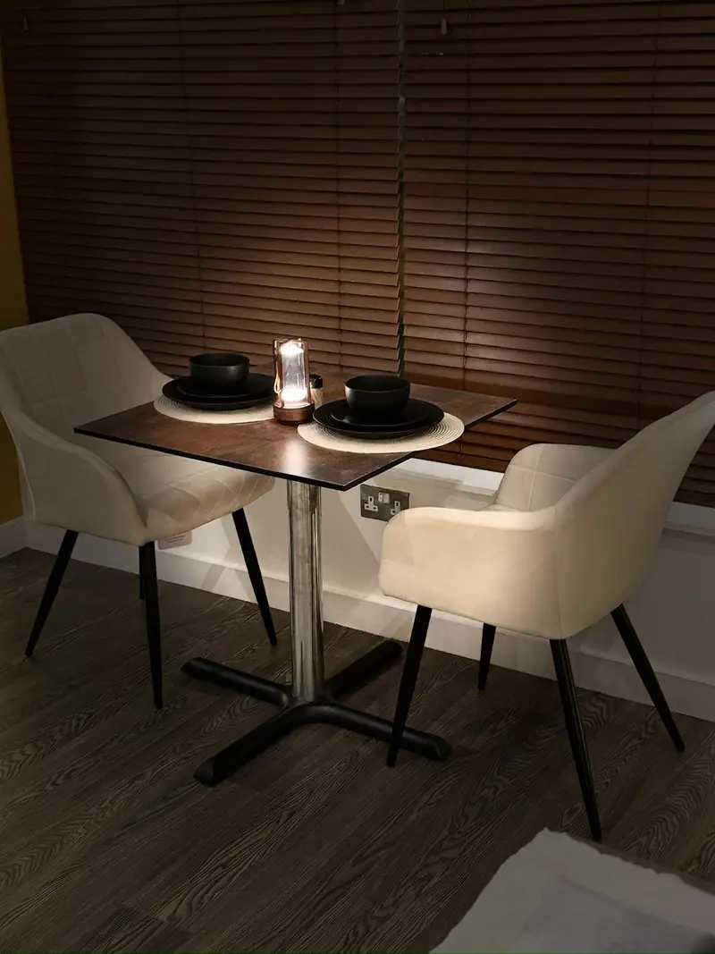 A candlelit table for two inside Backyard Africa